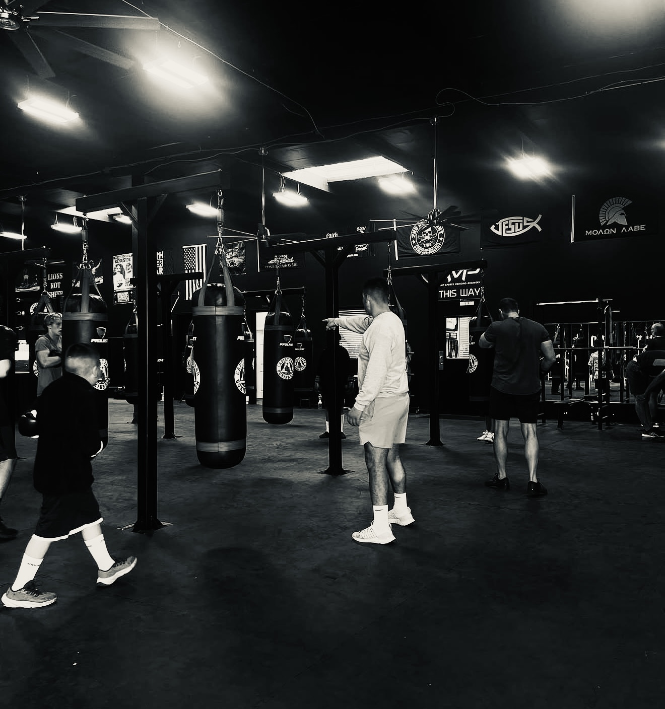 Athletes training on heavy bags